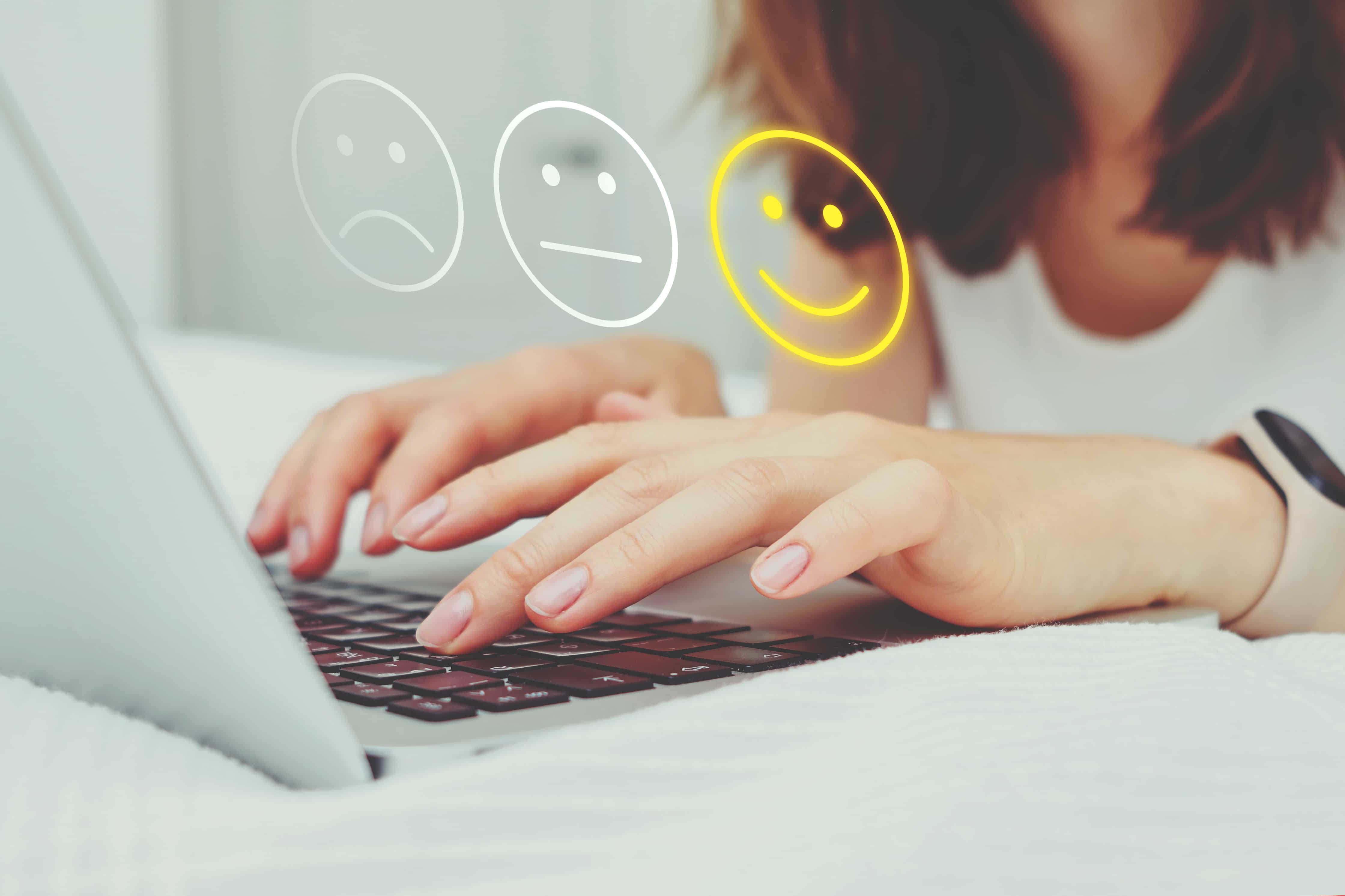 good-mood-concept-made-emoticon-rating-girl-puts-grades-internet-using-laptop_1