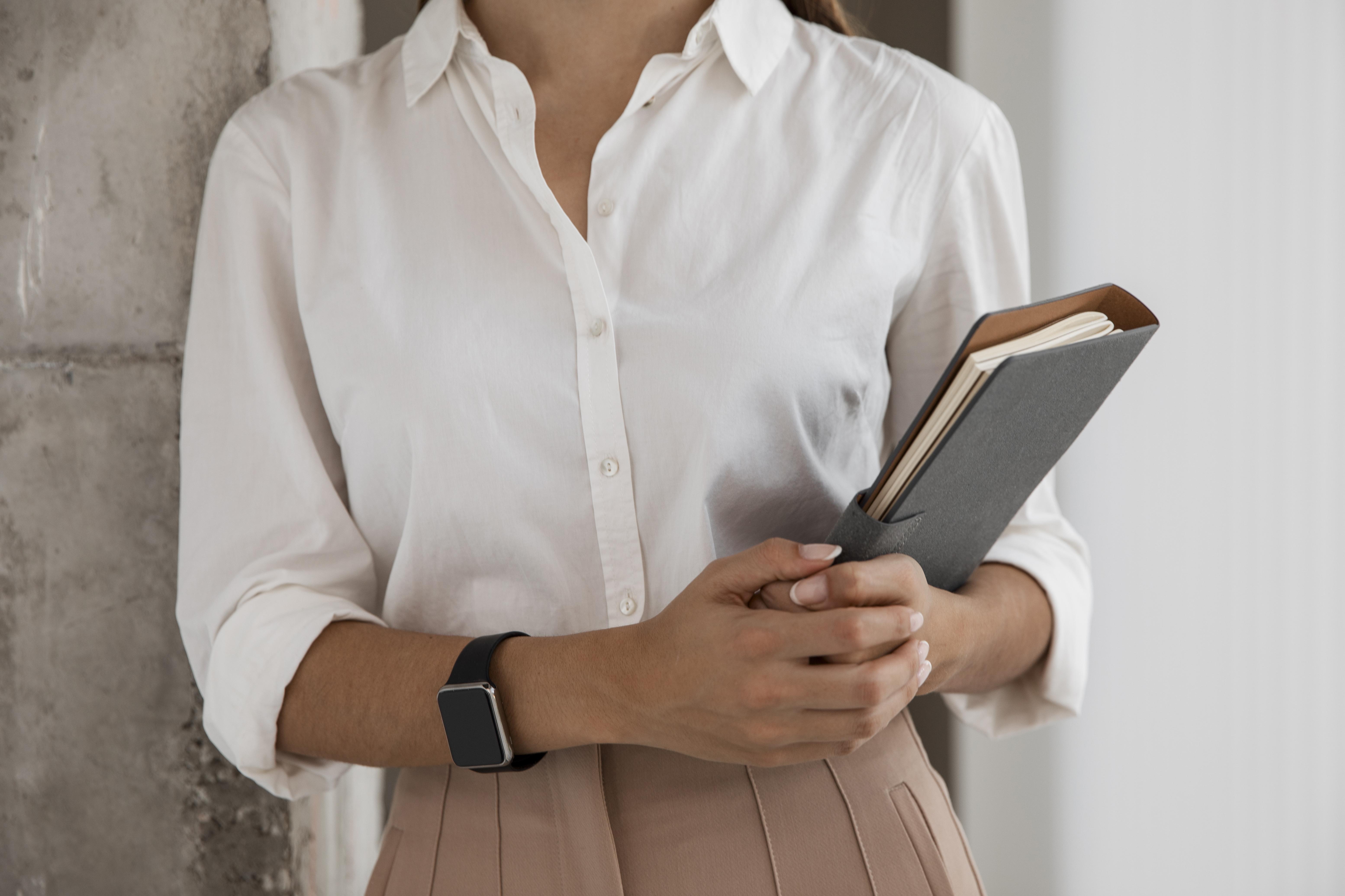 front-view-businesswoman-with-agenda