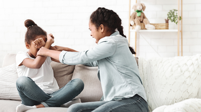 small-vecteezy_two-teenaged-african-girls-fighting-at-living-room_50840118_small