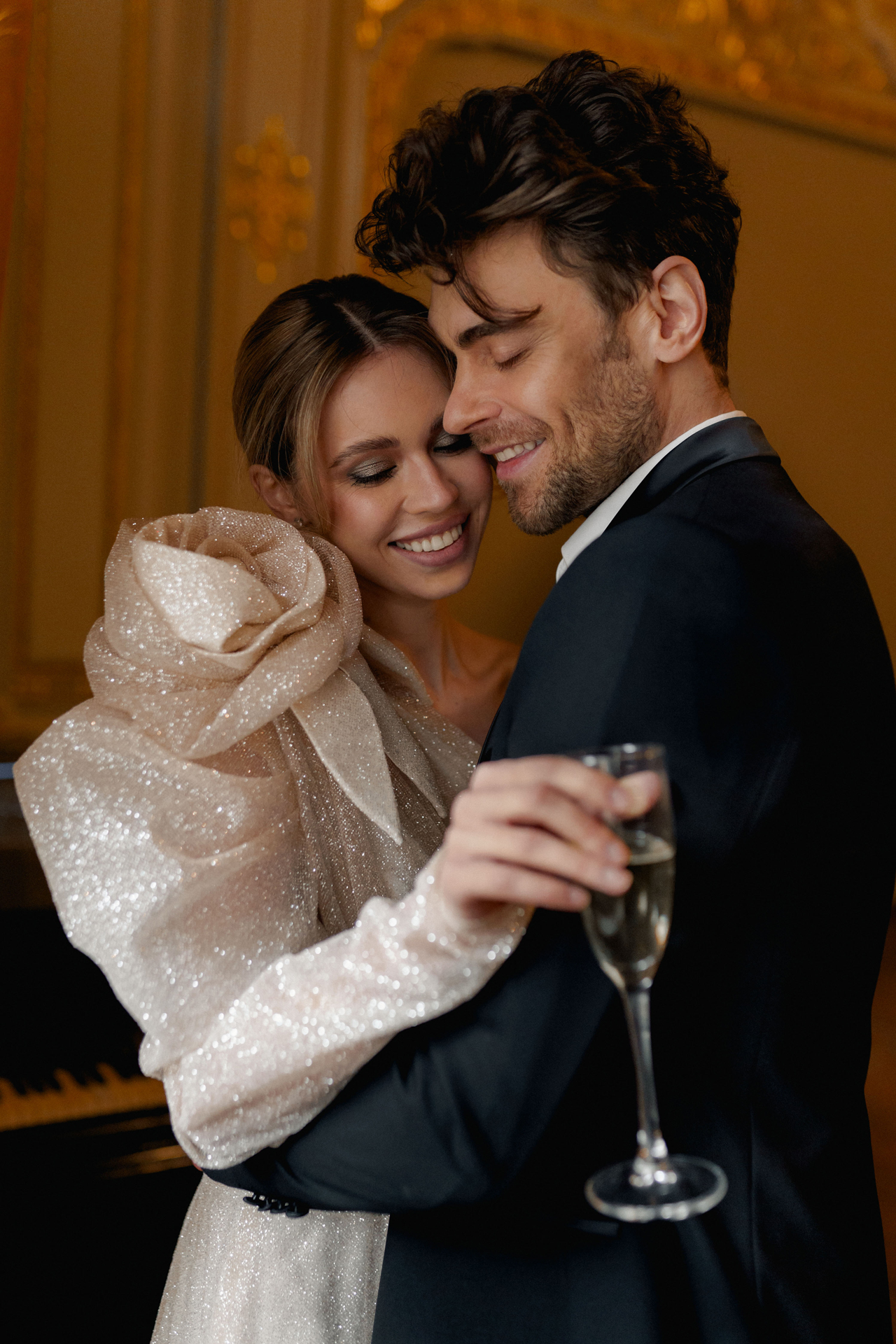 Smiling newlyweds hugging – wedding hairstylist services in Europe