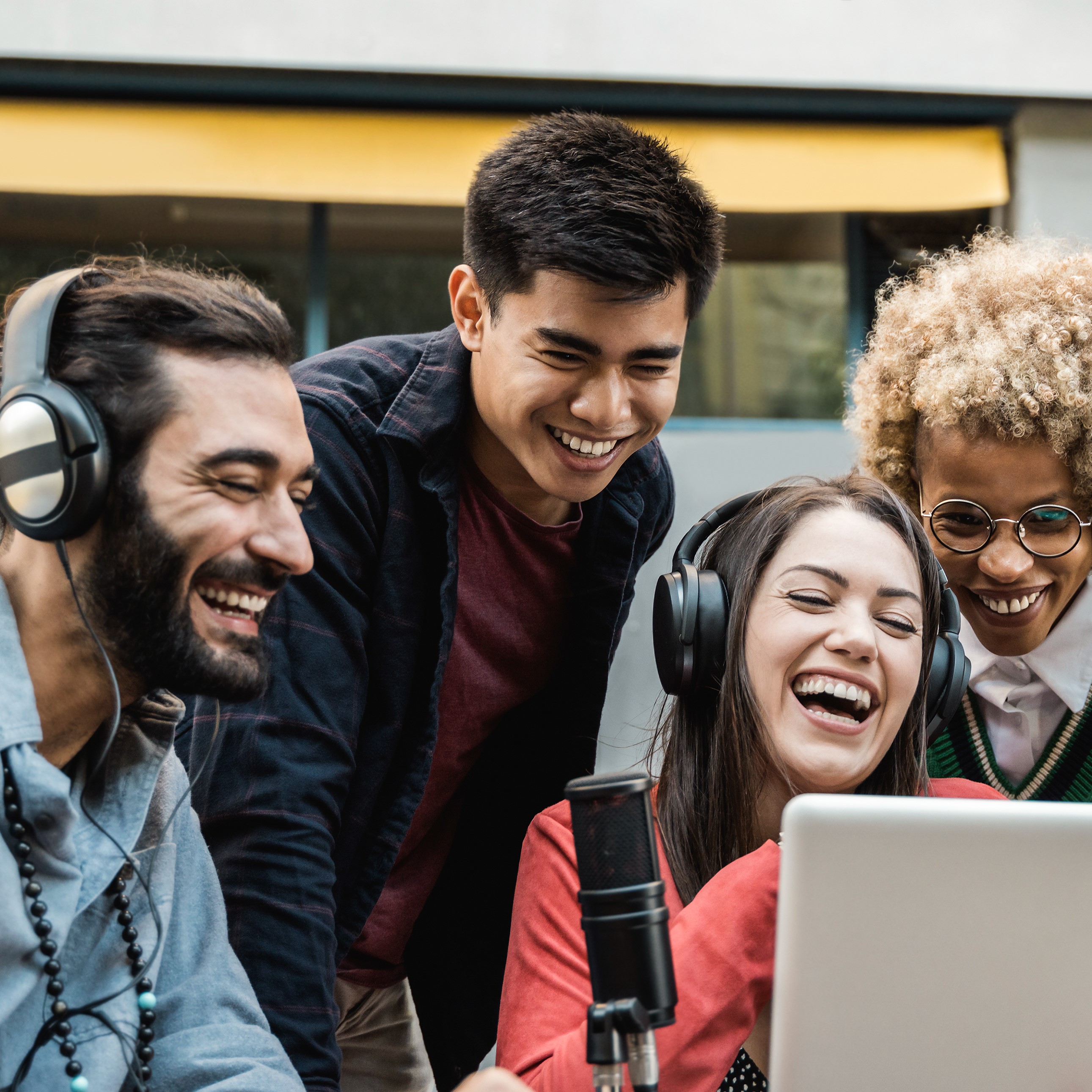 happy-people-doing-podcast-online-using-microphone-2023-11-27-05-06-40-utc