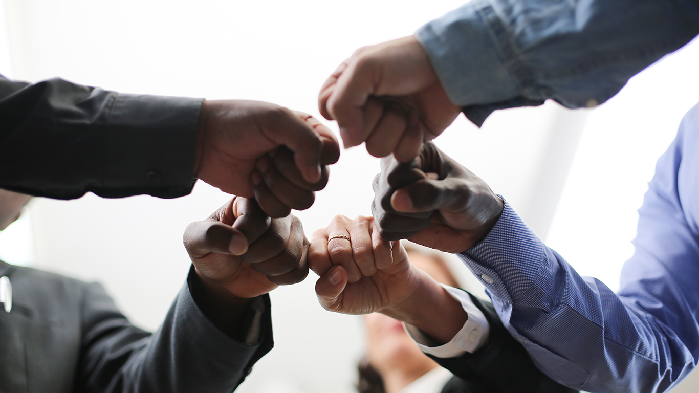 diverse-people-hands-together-partnership-2023-11-27-05-21-53-utc