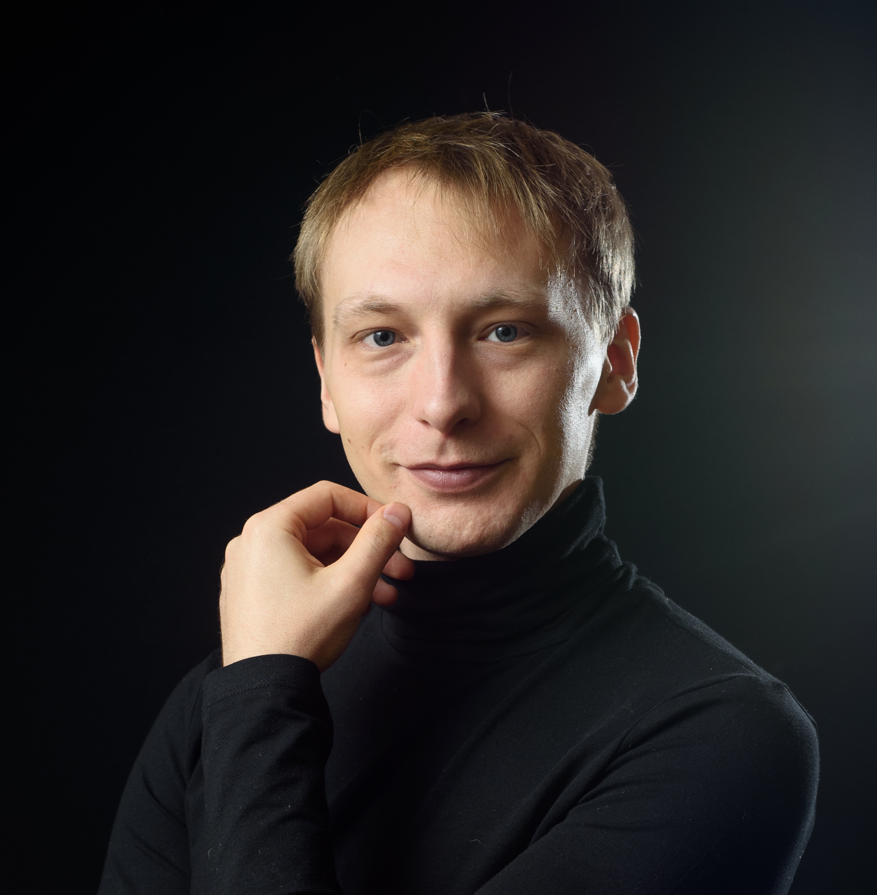 close-up-portrait-of-a-young-man-in-a-white-shirt-2024-10-17-02-49-24-utc