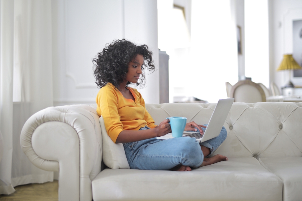 young-woman-works-with-computer-home